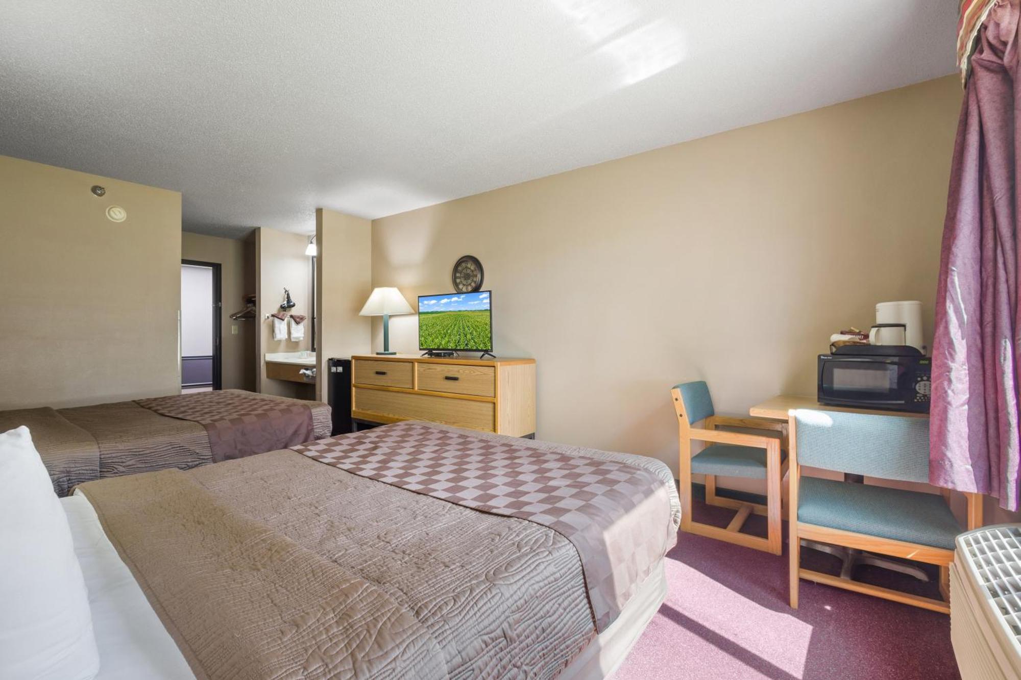 De Smet Super Deluxe Inn & Suites Bilik gambar