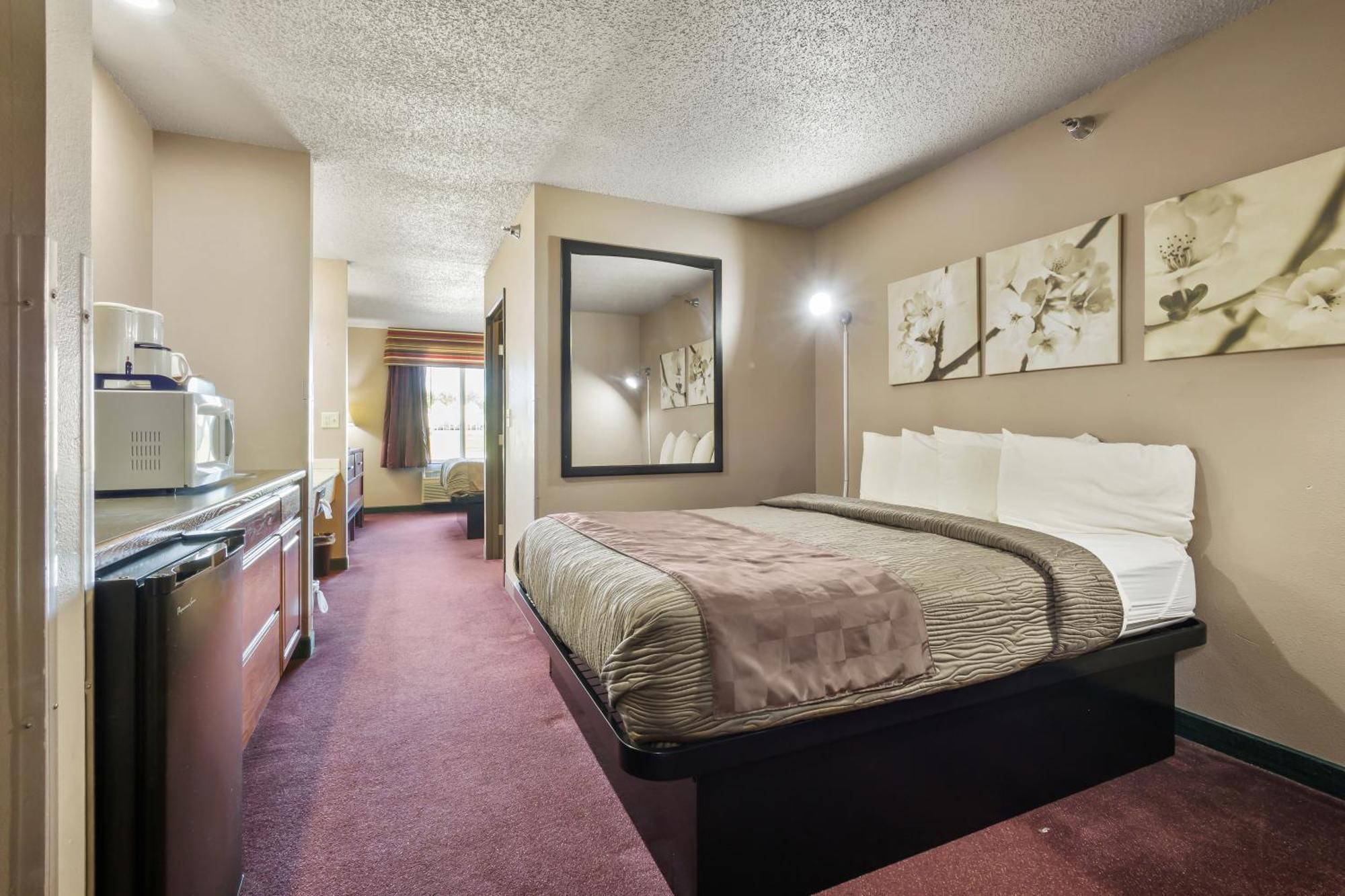 De Smet Super Deluxe Inn & Suites Bilik gambar